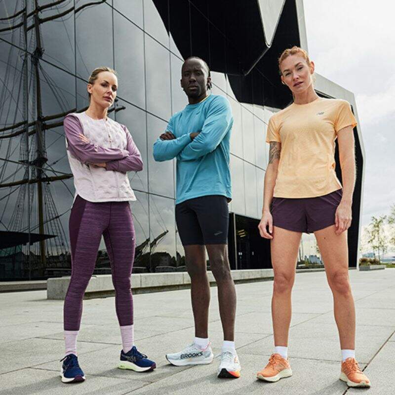 3 Personen in Sportoutfit